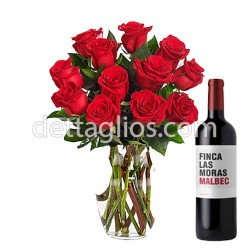Diseño Floral de 12 rosas en Jarrón con Vino